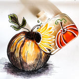 A hand-drawn watercolor and ink illustration of a large orange pumpkin with a stem and leaves, next to a clear glass bottle decorated with a small orange pumpkin and a yellow flower motif, on a white background.