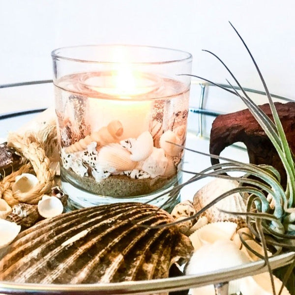 Coast Soy Wax Scented Candle Gel Tumbler.  A revitalising blend evocative of brisk coastal walks, ozonic sea air, sea shells and driftwood. Invigorating and uplifting. Hand decorated with shells. Reusable, comes with soy wax refill.